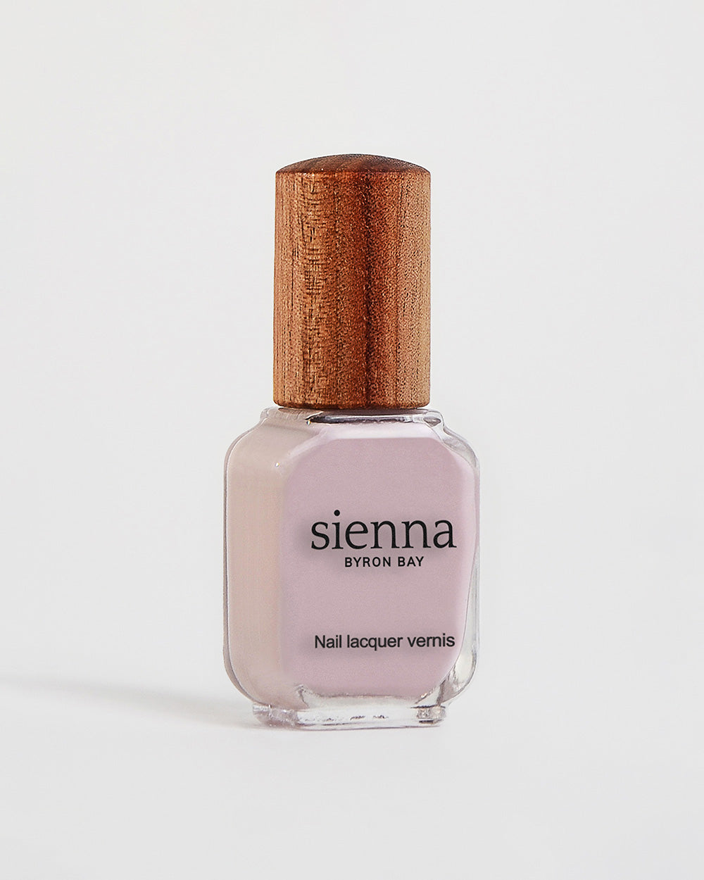 Tranquility Light Mauve Rose Crème nail polish bottle with timber lid by Sienna Byron Bay.Tranquility Light Mauve Rose Crème nail polish bottle with timber lid by Sienna Byron Bay.