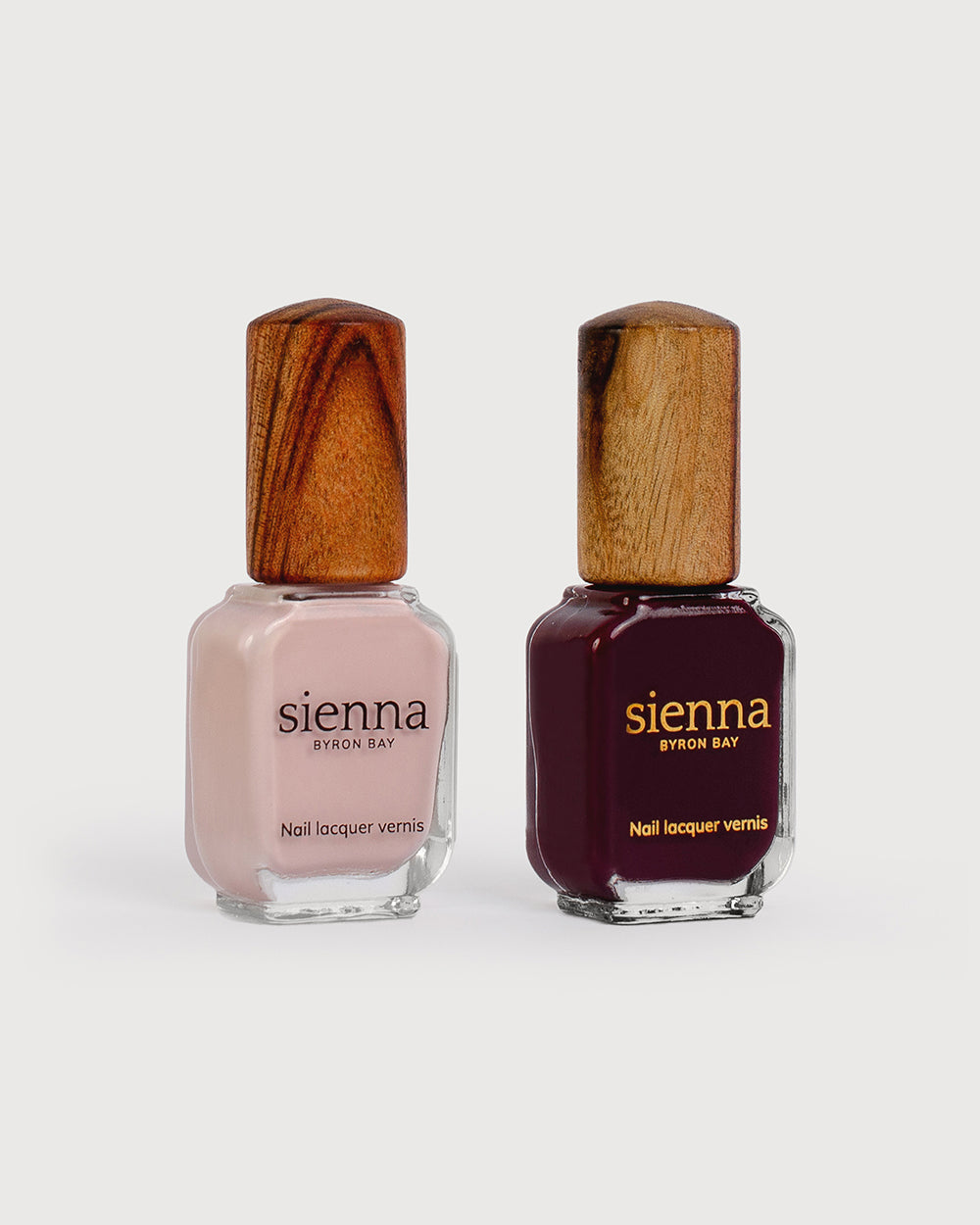 light champagne pink magenta plum nail polish bottles with timber cap