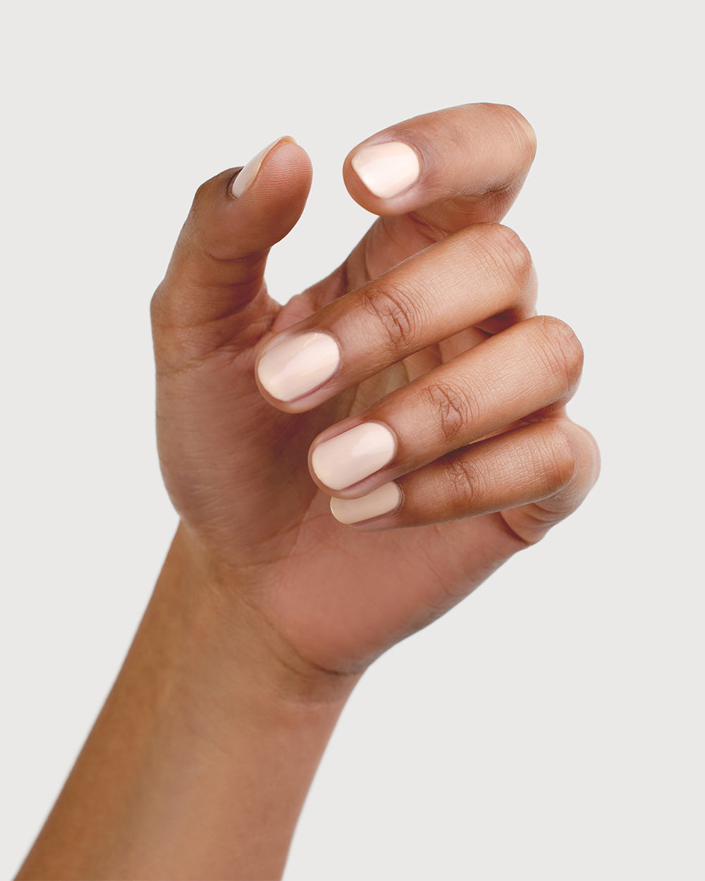 Nude Light Peach Sienna Nail Polish on Medium Skin Tone