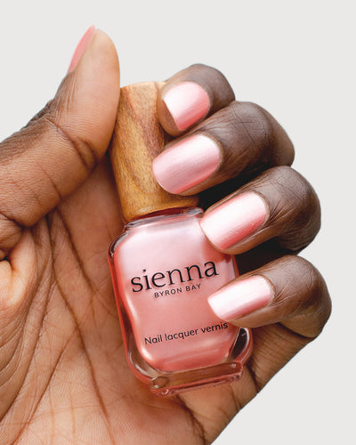 Warm Pink Satin Nail Polish on Dark Skin Tone