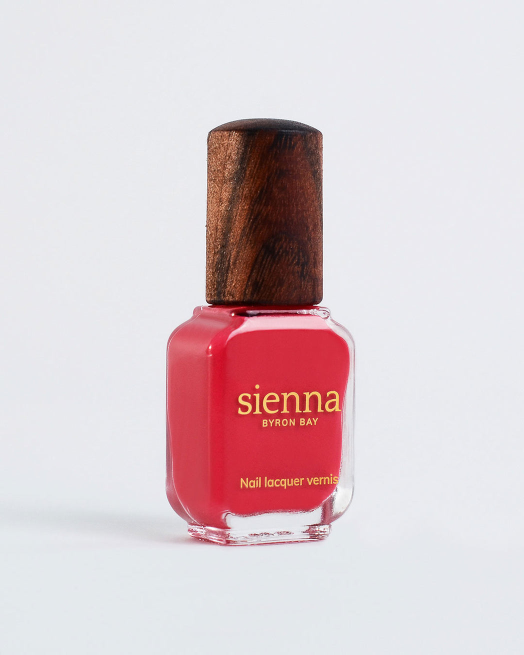 Bright Topaz Pink nail polish bottle with timber cap by Sienna Byron Bay