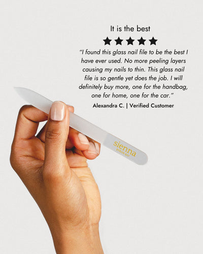 hand holding glass nail file with 5 star review
