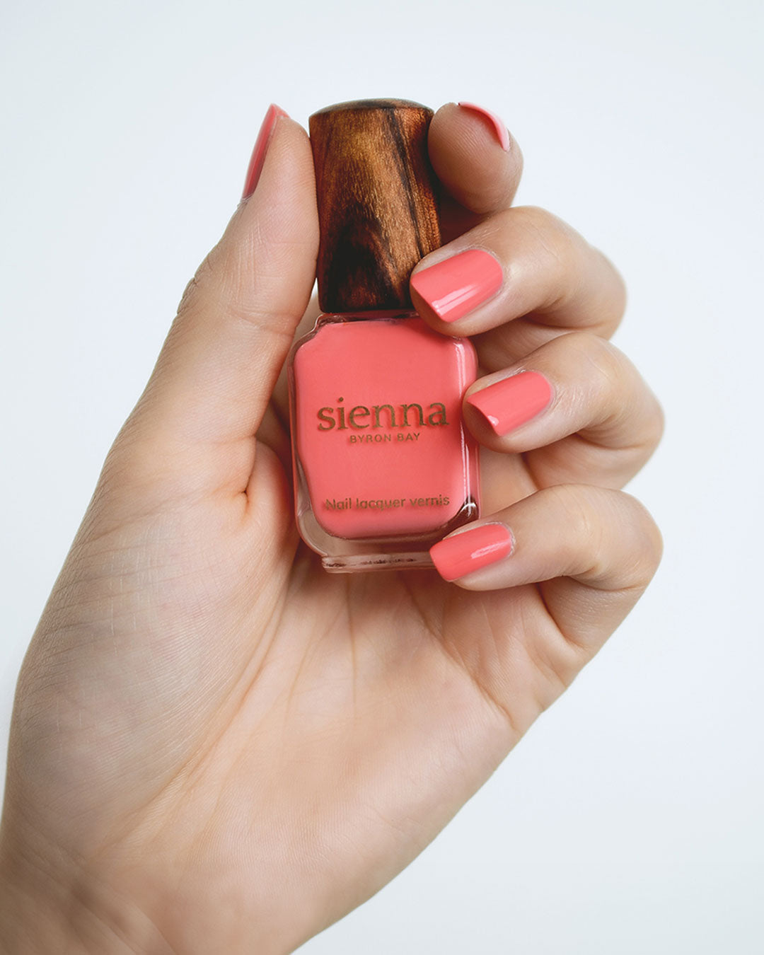 Grapefruit Pink nail polish swatch on fair skin tone by Sienna Byron Bay