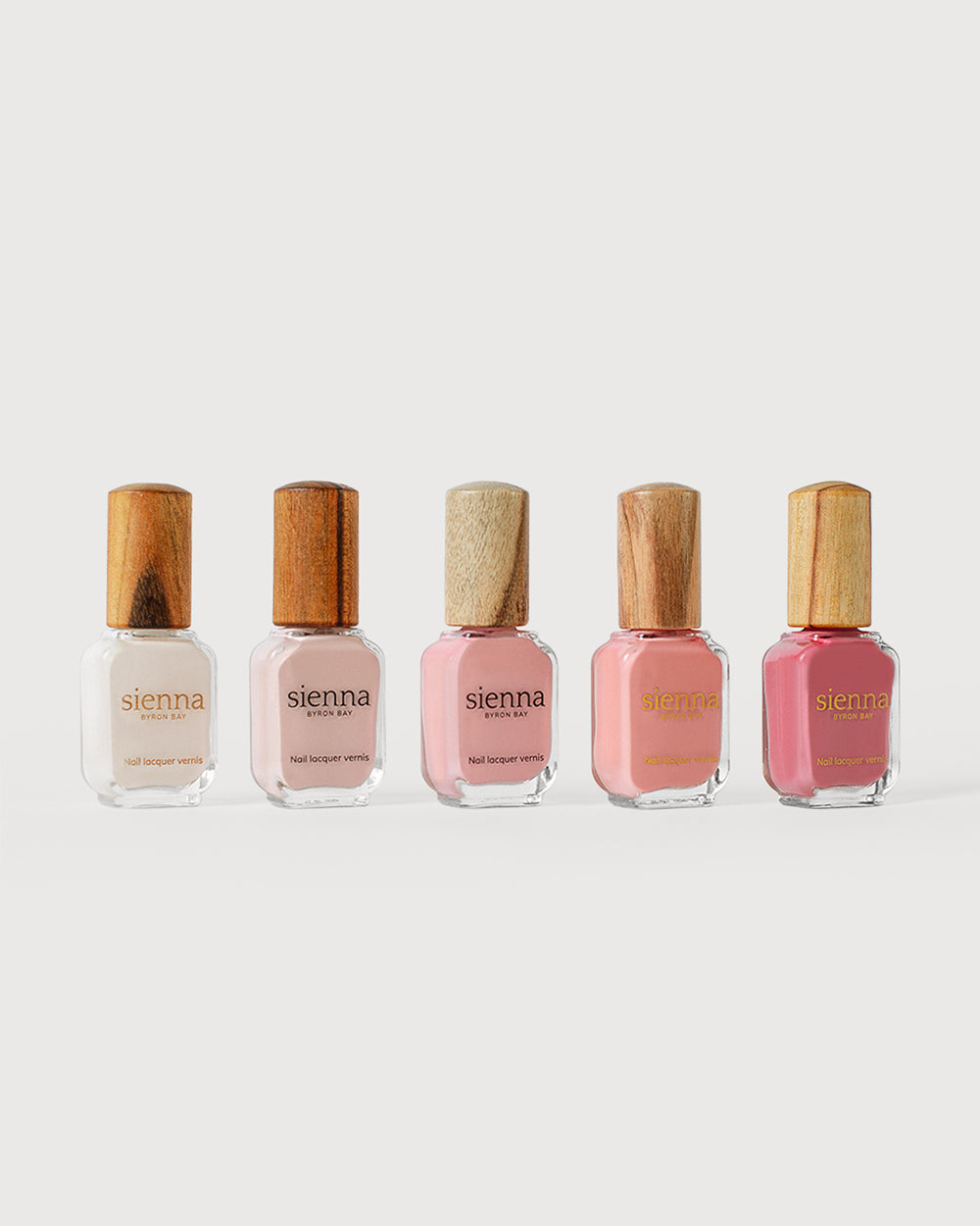 Collection of 5 pink Sienna Nail Polish Bottles