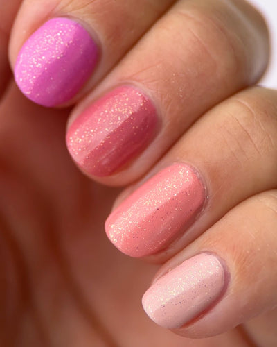 Celestial Top Coat painted on pink nail polish 