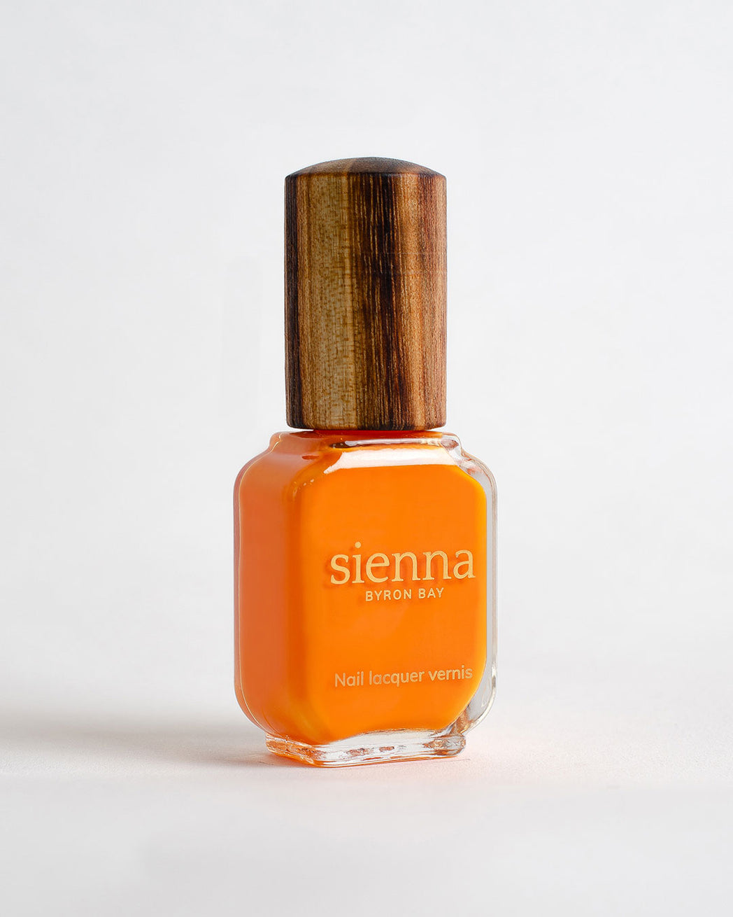Bright papaya Orange nail polish bottle with timber cap by Sienna Byron Bay