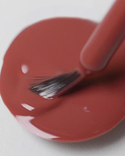 Swirl video of brick red nail polish By Sienna Byron Bay