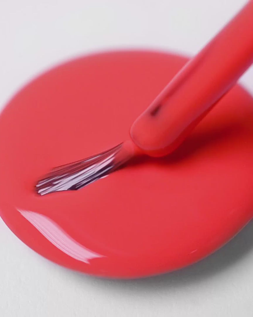 Warm strawberry red nail polish swirl video with brush