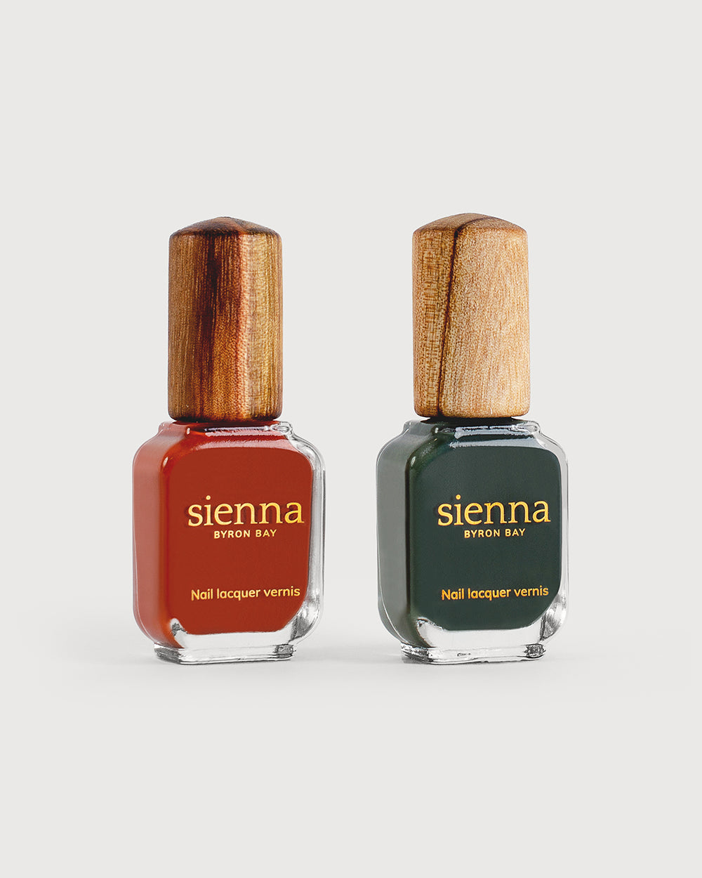 Mid-tone terracotta, Deep olive nail polish bottles with timber cap