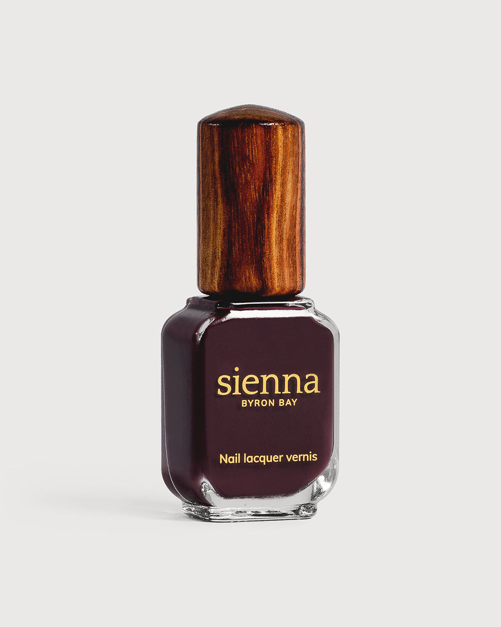 Aubergine nail polish glass bottle with timber cap