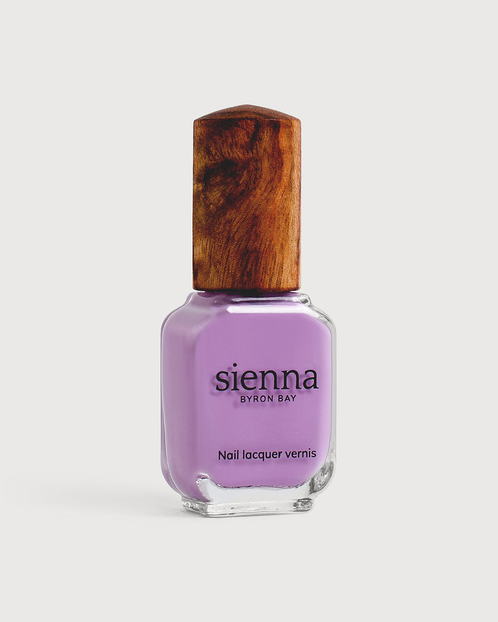 Mid-tone lilac nail polish glass bottle with timber cap
