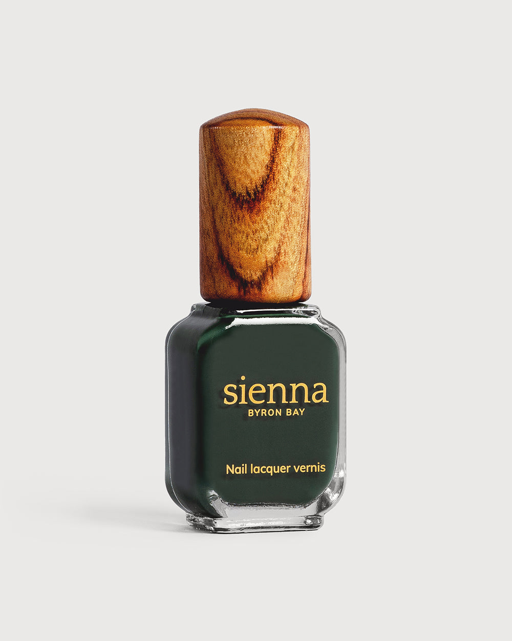 deep olive green nail polish glass bottle with timber cap