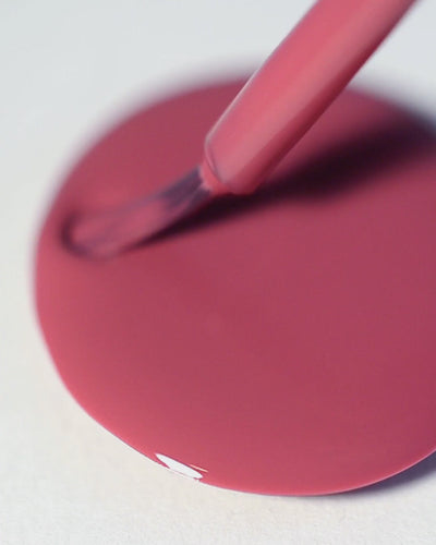 A nail polish swirl of Heartspace raspberry sorbet crème by Sienna Byron Bay close-up.